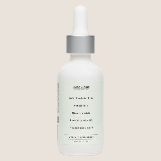 Skincare serum bottle with dropper on a light beige background