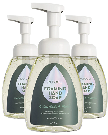 Three bottles of Puracy Foaming Hand Soap on a white background