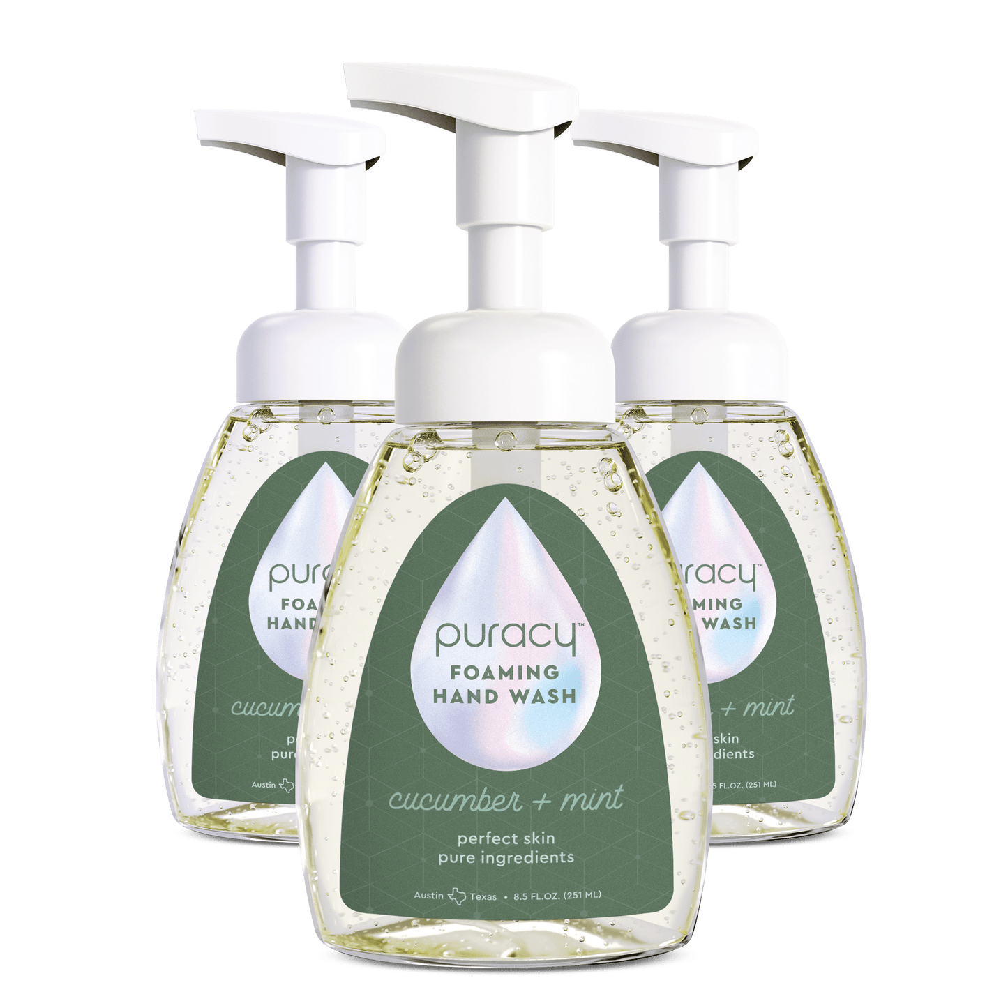 Three bottles of Puracy Foaming Hand Wash on a green background