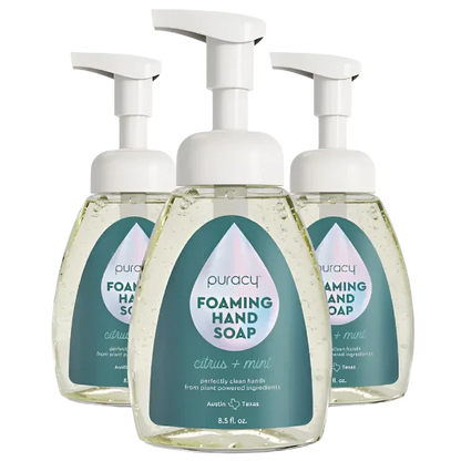 Three bottles of Puracy Foaming Hand Soap with pump dispensers on a white background.